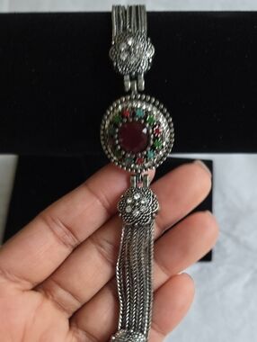Silver-Tone Bracelet with Red Center and Green Accents